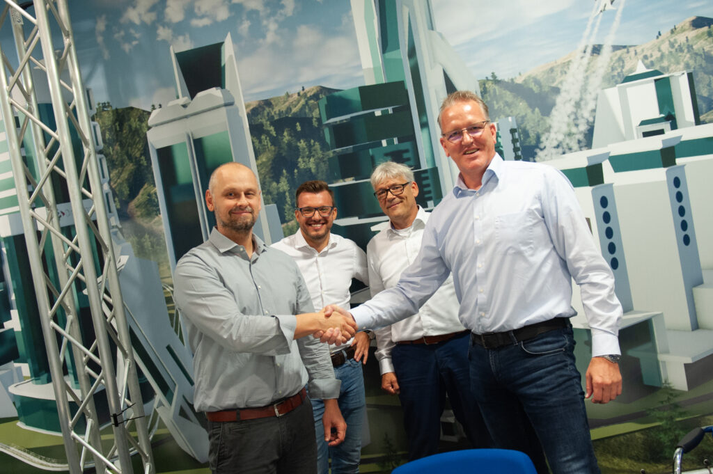 Van links naar rechts: Andreas Smarsly; CPO Deutsche GigaNetz, Alexander Scheel; projectinkoop Deutsche GigaNetz, Jon Pijnacker; directeur Allinq GmbH, Wim Beukers; directeur Allinq Group